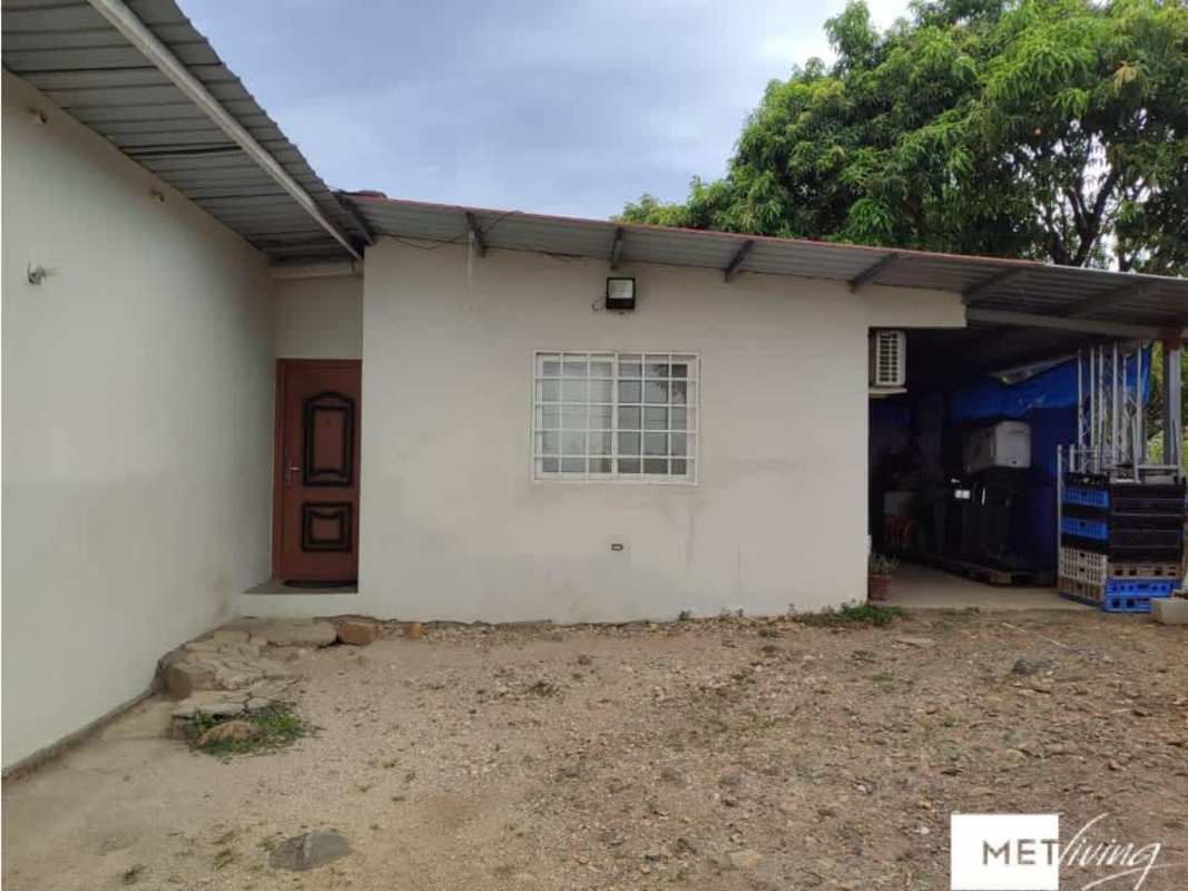 Single-story exterior with metal roof and covered area country house in Utive Pacora Panama