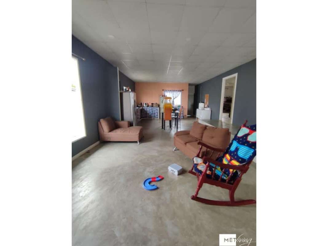 Open living dining room in countryside home Utive Pacora Panama with tiled floors