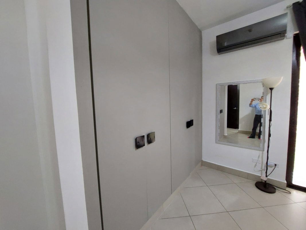 Spacious master bedroom with balcony furnished Embassy Club Clayton Panama