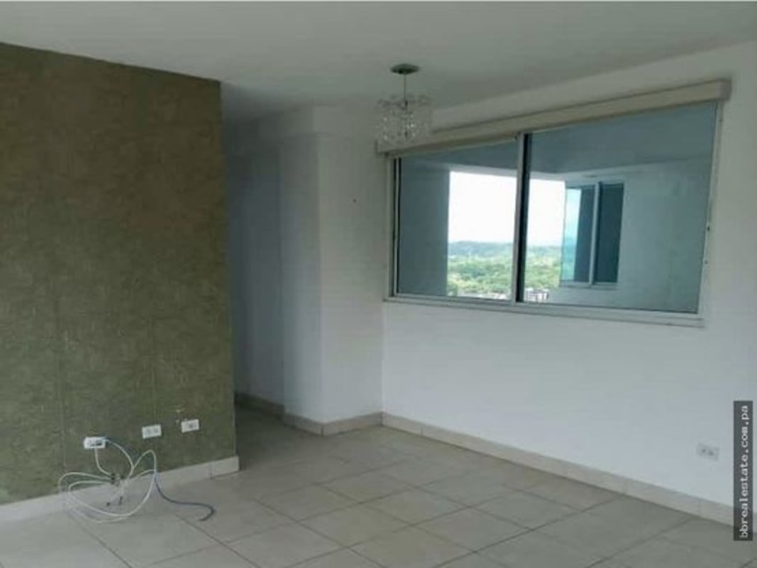 Rooftop swimming pool area with panoramic city skyline views at PH El Mare Edison Park Panama