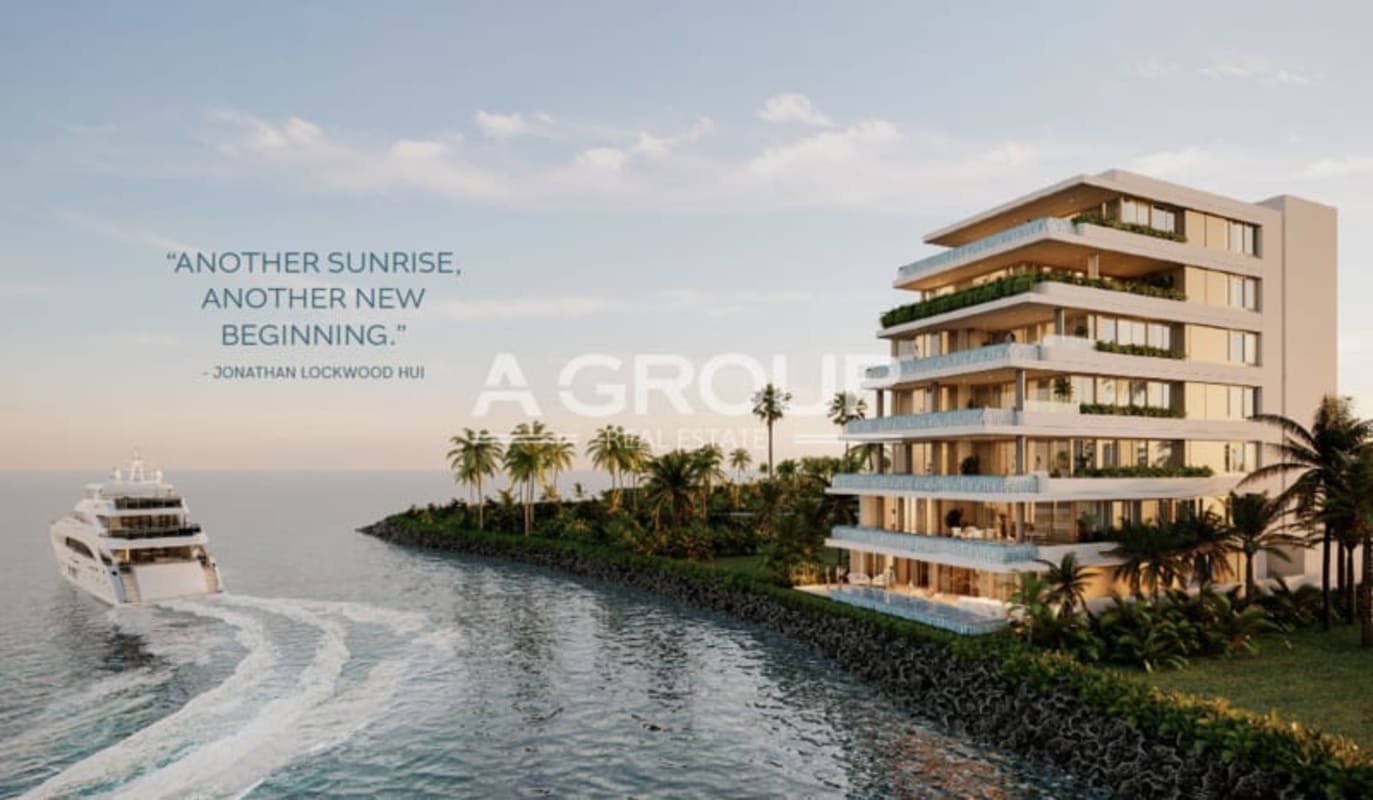 Contemporary waterfront condo with large balconies, lush landscaped palm trees in Ocean Reef Islands Panama