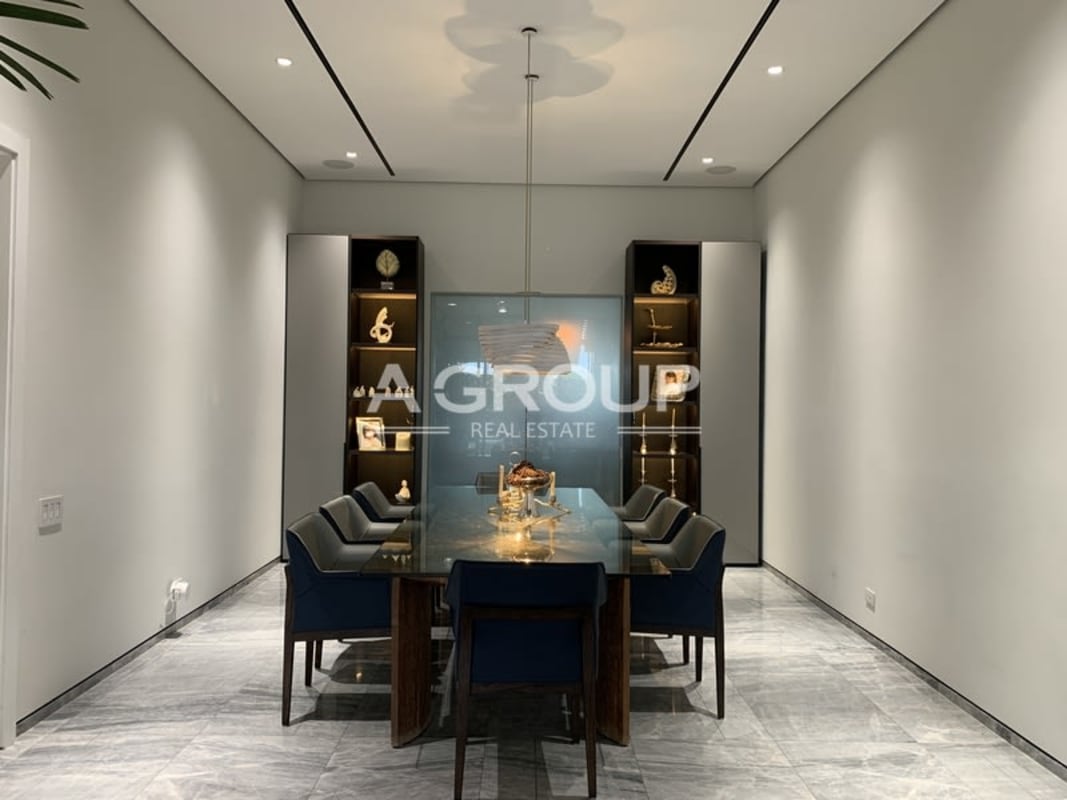 Open plan living dining area with marble floors large windows in Garden Apartments Ocean Reef Islands Panama