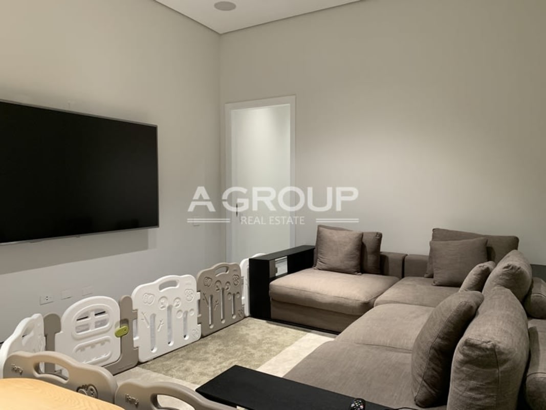 Kitchen with marble counters, built-in ovens and modern cabinetry at Garden Apartments Ocean Reef Panama