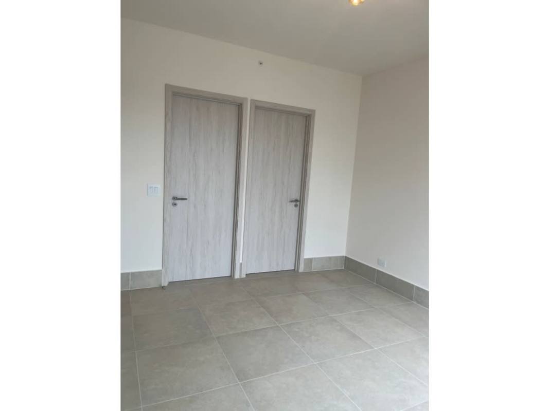Entryway with light wood doors, neutral walls, tile flooring in Ocean House Santa María Panama