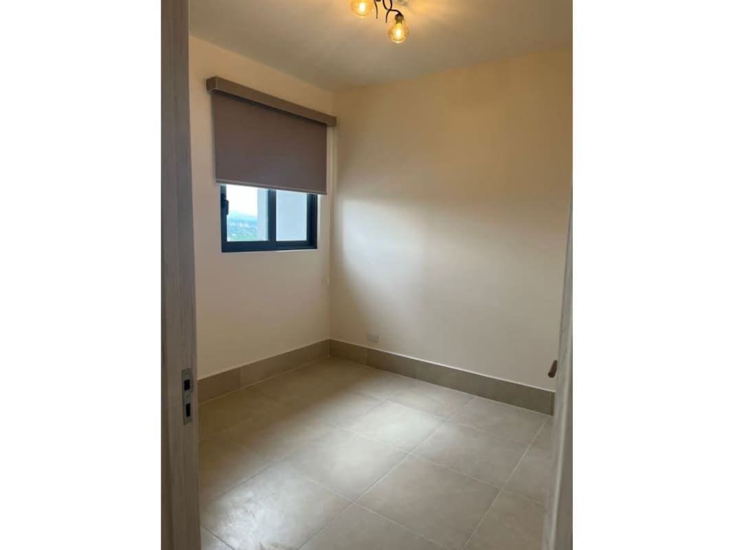 Guest bathroom with marble countertops and floating vanity in Ocean House Santa María Panama