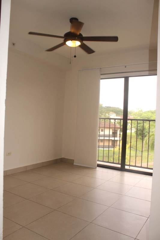 Bathroom with beige tiles built-in tub chrome fixtures Embassy Club Courtyard Clayton Panama