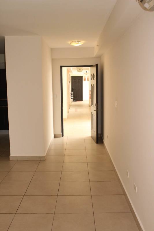Bright master bedroom with balcony access split AC Embassy Club Courtyard Clayton Panama