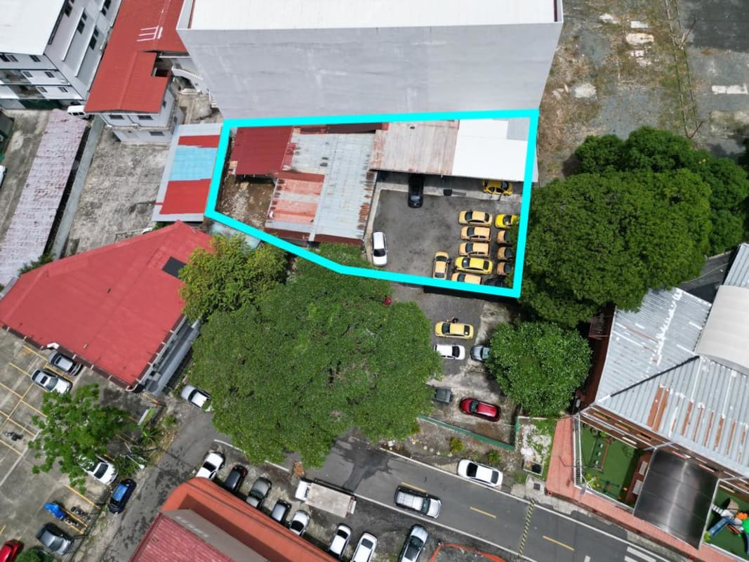 Aerial cityscape highlighting available commercial lot outlined in El Cangrejo, Panama City.