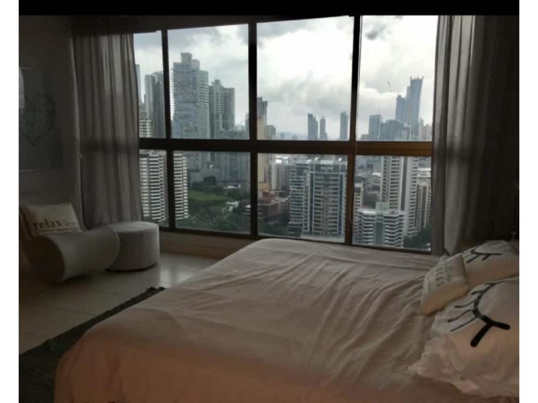 Bedroom with queen bed, abstract art, neutral colors PH Ocean Park Punta Pacifica Panama