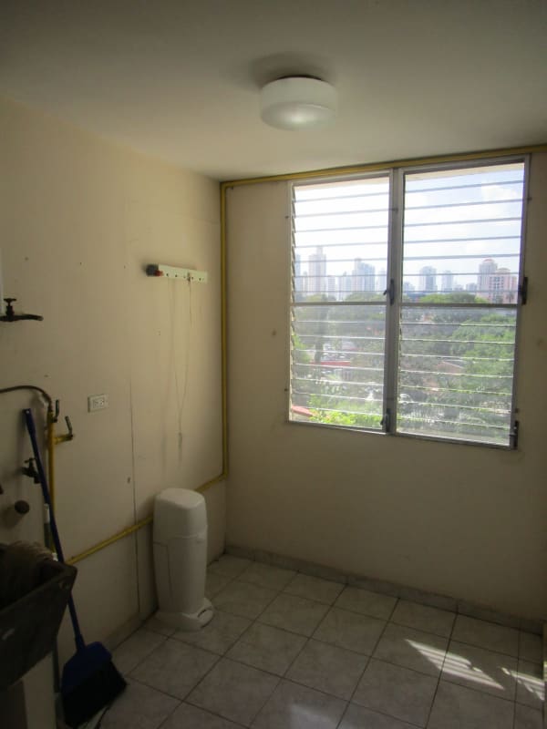 Utility or maid's room with window city skyline view PH El Carmen Panama
