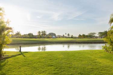 Spacious master suite featuring garden views and marble floors in Buenaventura Panama villa rental