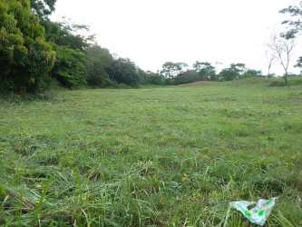 Flat undeveloped land parcel surrounded by residential growth Nuevo Emperador Panama