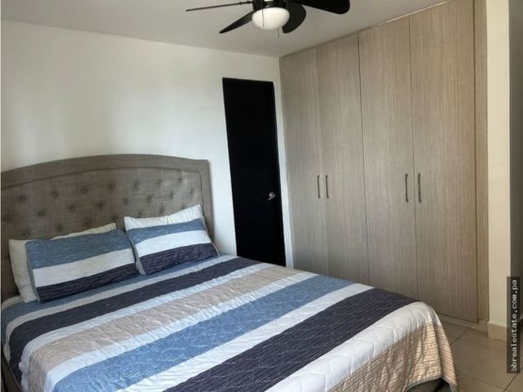 Spacious bedroom with wardrobe, tiled floor and fan PH Belview Towers Panama