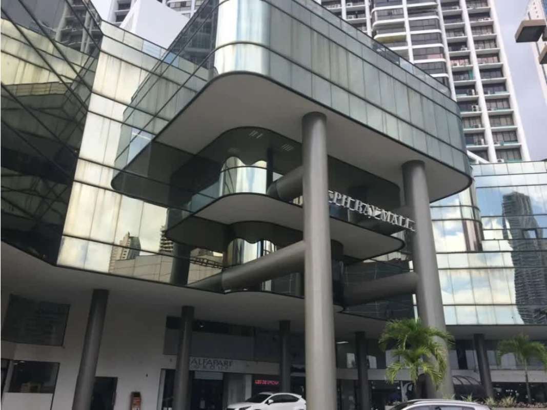Modern glass facade building PH Bay Mall located on Avenida Balboa, Panama City