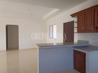 Open kitchen with granite countertop and wood cabinets Rio Grande Penonomé Panama