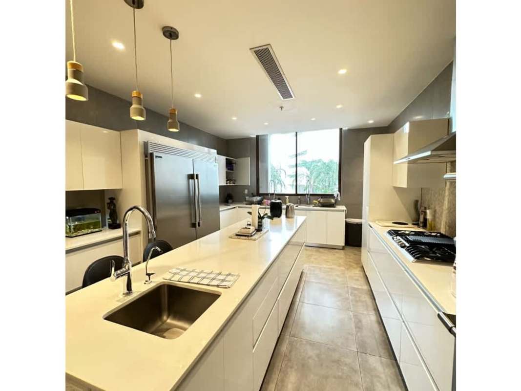 Luxury modern kitchen with center island stainless appliances PH The Residences Punta Pacífica Panama