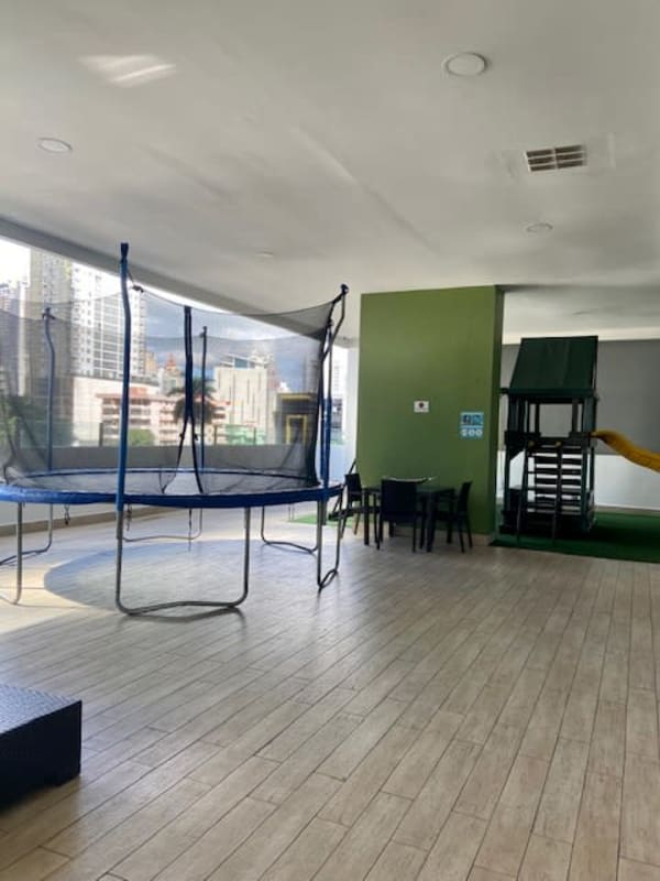 Open plan living dining room with wood floors, ceiling lights in PH The Palm Obarrio Panama