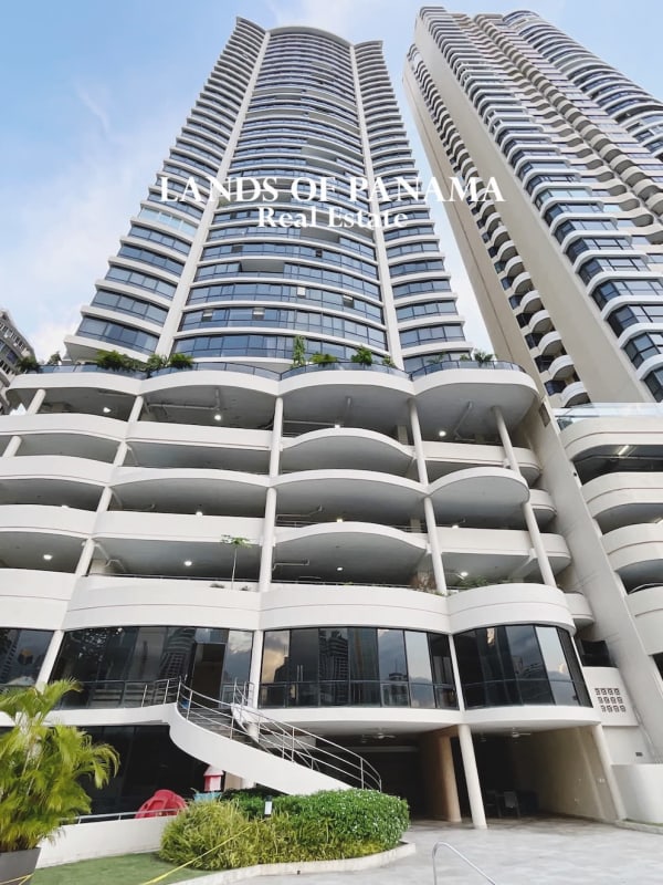 View of PH Golden Palace towers modern high-rise with balconies and landscaped entrance Punta Paitilla Panama
