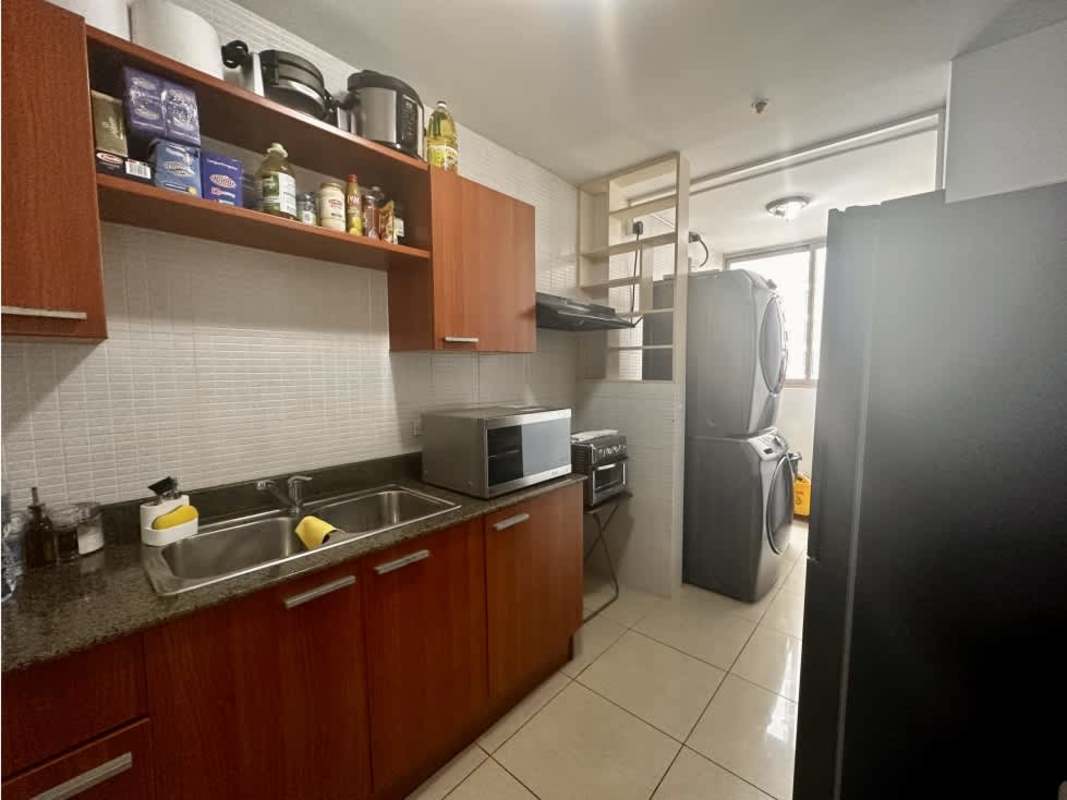 Dining room with glass table, hanging hammock chair, mirror wall PH San Francisco Bay Panama