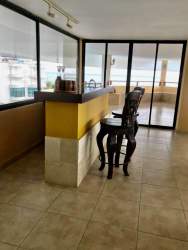 Contemporary kitchen with granite countertops and stainless appliances in PH Bahia Resort Coronado Panama