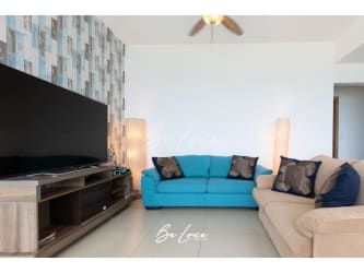 Bedroom with balcony, ocean views, white decor in Bijao Beach Club Panama