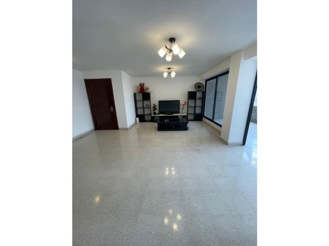 Modern kitchen with granite countertops and wood cabinetry PH Macondo Obarrio