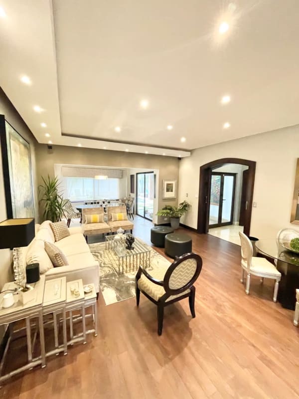 Large covered terrace featuring barbecue area, outdoor dining and lounge by private pool Costa del Este