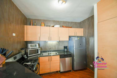 Fully equipped kitchen with granite countertops and stainless appliances in Founders 2 Playa Blanca