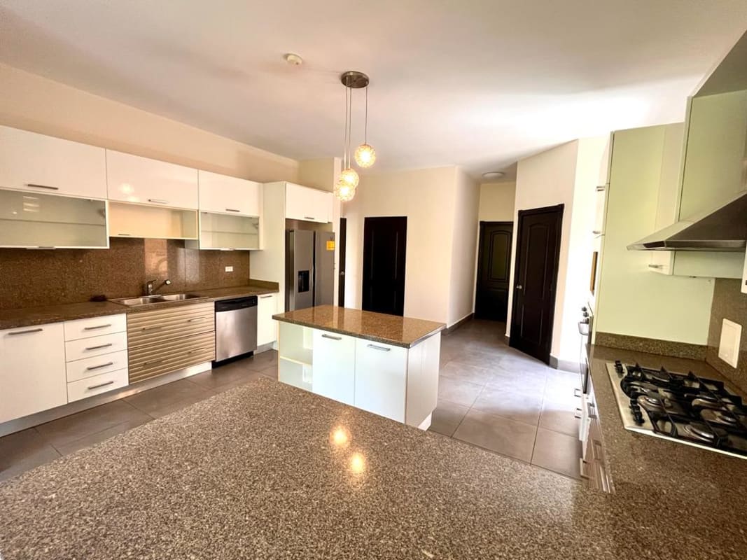 Spacious master bedroom with balcony walk-in closet marble floors Panama luxury home