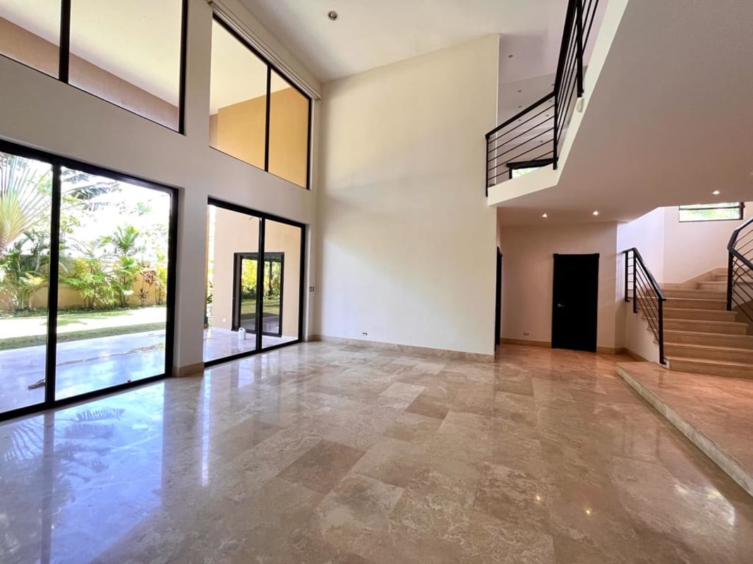 Impressive double-height foyer marble floors staircase luxury home La Antigua Costa del Este