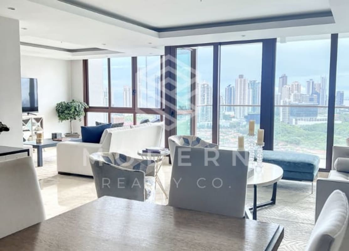 Modern open-concept living room with panoramic city and golf course view Santa Maria Panama