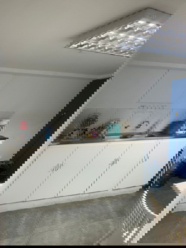 Interior of commercial unit with AC, tile floors, white walls in Panama