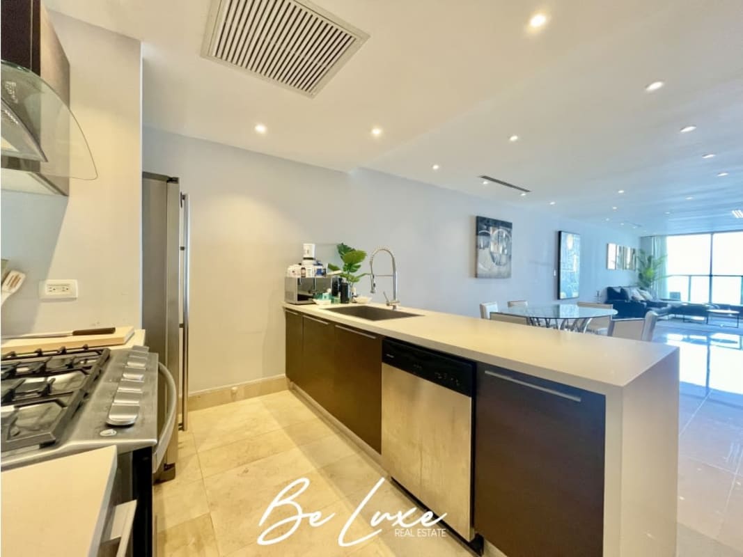 Spacious king-size master bedroom with ocean view window in PH Yoo Panama Panama City