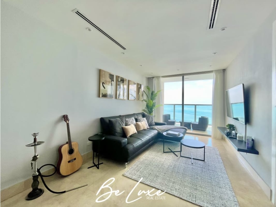 Contemporary open kitchen with island, stainless appliances, marble floor PH Yoo Panama