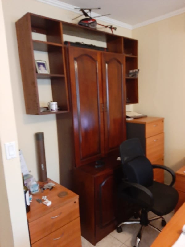 Large kitchen with island double fridge wood cabinets tile Villa las Fuentes