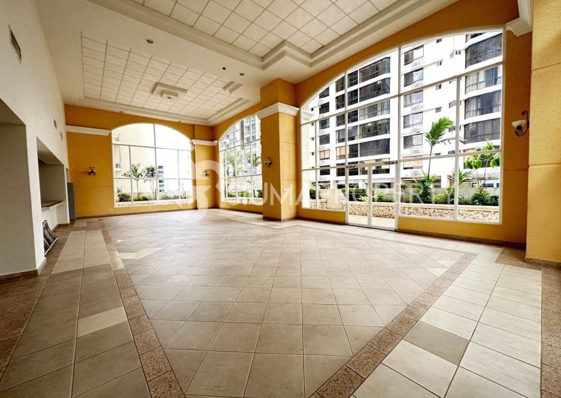 Spacious bedroom with windows and built-in closets in PH Victoria Tower