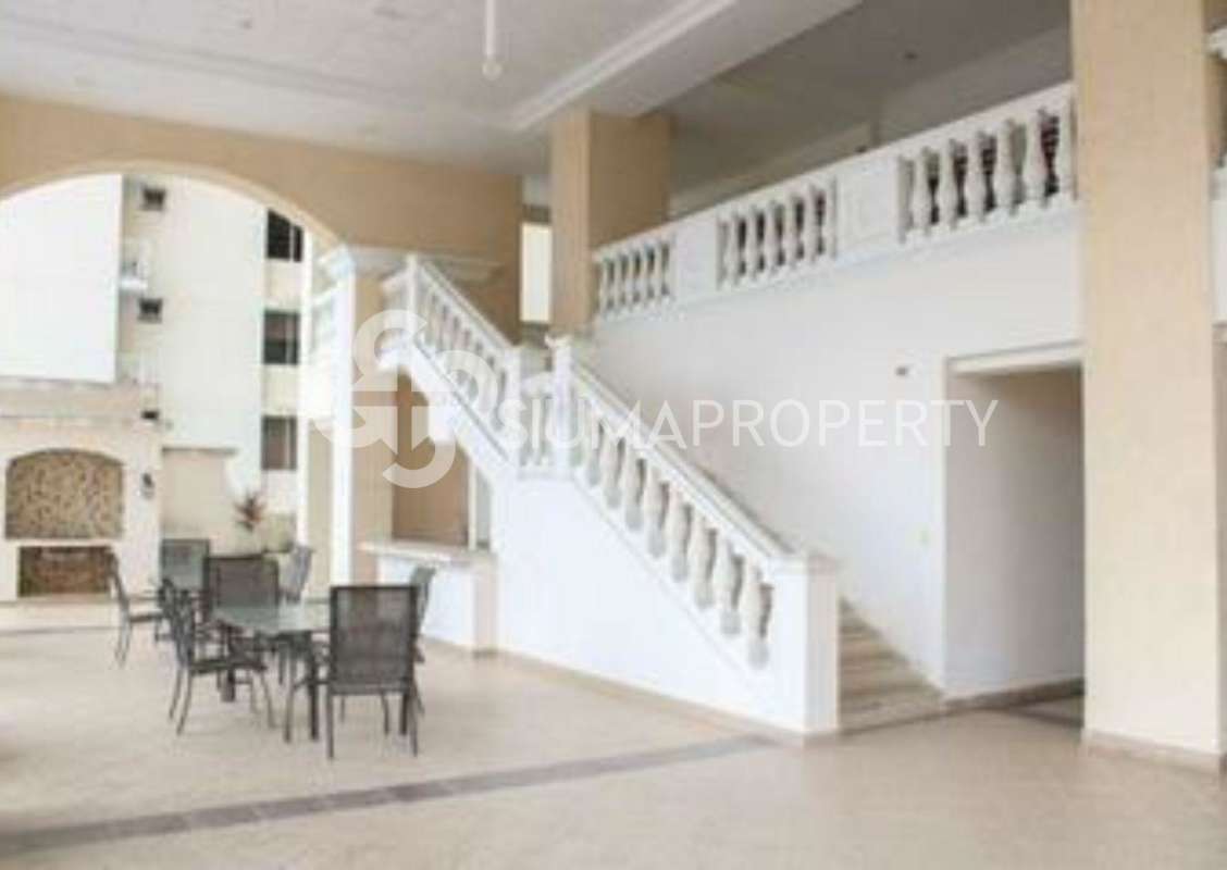 Mediterranean-inspired interior with arches and staircase PH Victoria Tower