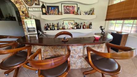 Bright living area with tile floors, terrace views in luxury villa Coronado Panama