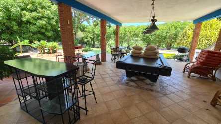 Elegant guest bedroom with natural light and garden views Coronado Beach villa Panama