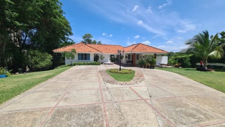 Large swimming pool with landscaped tropical gardens luxury villa Coronado Beach Panama