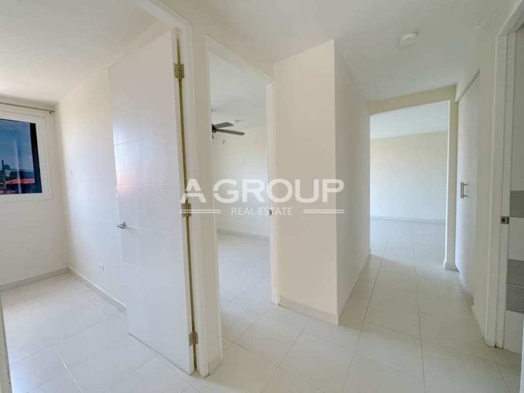 Dedicated laundry space with sink and window at Torres de Versalles II
