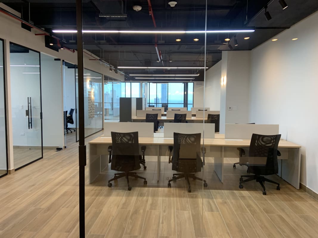 Compact kitchenette with cabinets and sink in PH BICSA Tower office unit for rent