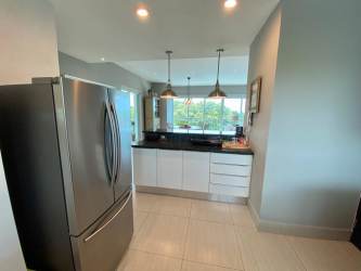 Master bedroom with large windows and access to ocean view balcony Punta Barco Panama