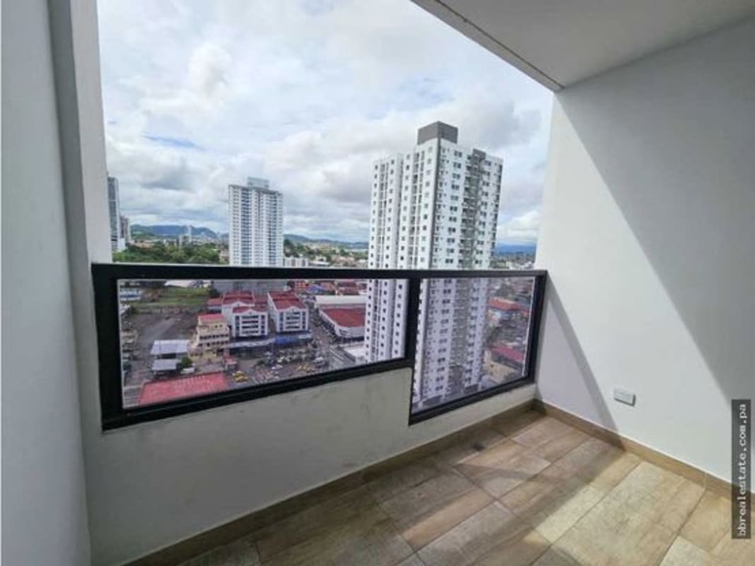 Spacious modern living and dining area with panoramic windows and city view in PH Canvas Tower Panama