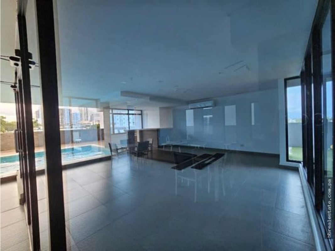 Second bedroom with wardrobe and natural lighting in PH Canvas Tower Panama City