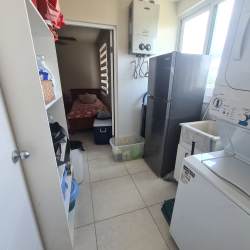 Bright master bedroom with oceanview, king bed, balcony access in Bijao Quarry Heights Panama