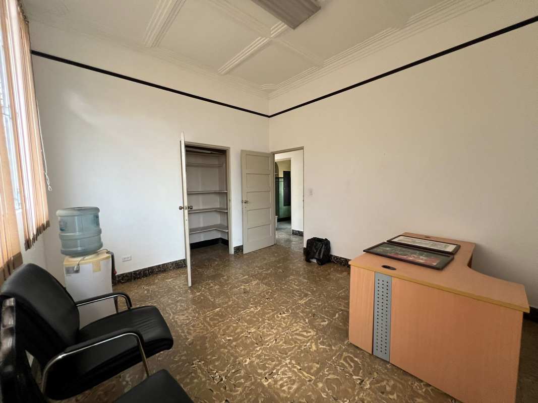 Simple bright interior with marble floor, arched opening for office rent Perejil Calidonia