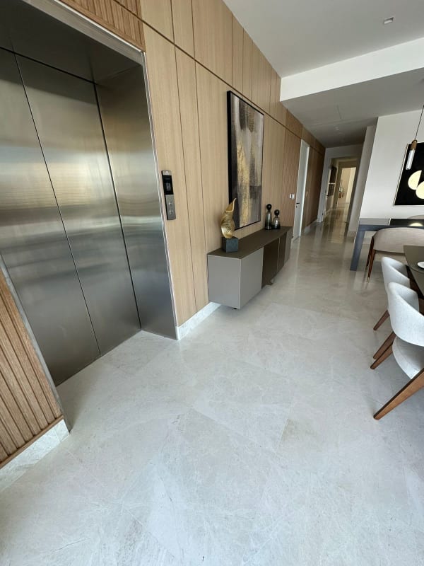 Bright master bedroom with built-in wardrobe large window and ocean view in Ocean Reef Islands Panama