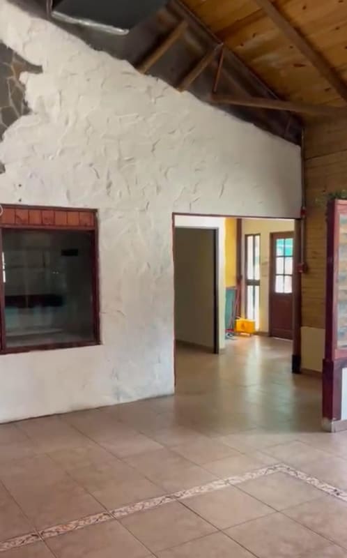 Large open commercial space with wood beam ceiling interior Panama City rental