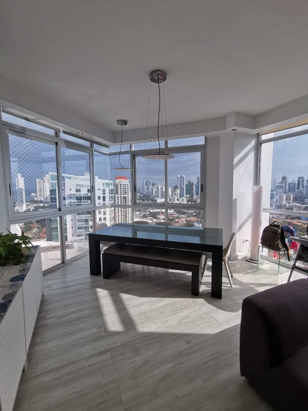 Modern dining area with panoramic balcony overlooking ocean at PH San Francisco Bay Tower 300 Panama City